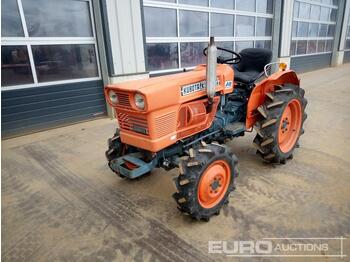 Compact tractor Kubota L1500DT: picture 1
