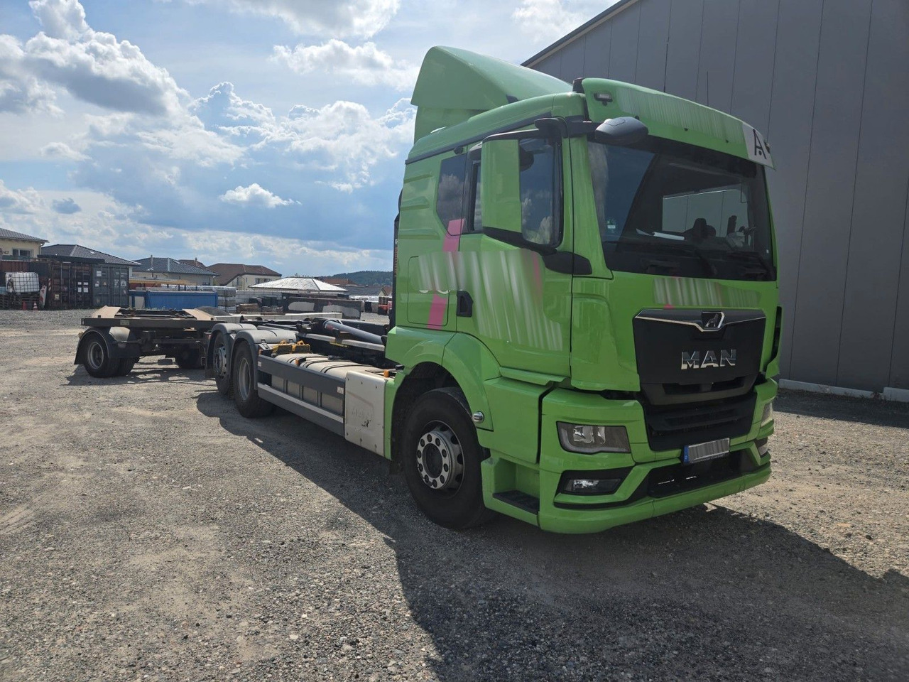 MAN TGS 2651 Abrollkipper HIAB Lift -Lenkachse - Hook lift truck: picture 2 MAN TGS 2651 Abrollkipper HIAB Lift -Lenkachse - Hook lift truck: picture 2