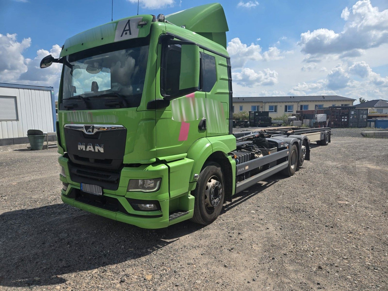 MAN TGS 2651 Abrollkipper HIAB Lift -Lenkachse - Hook lift truck: picture 1 MAN TGS 2651 Abrollkipper HIAB Lift -Lenkachse - Hook lift truck: picture 1
