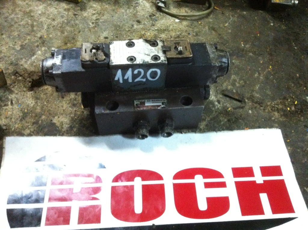 VOGELE 682440200 - 1 SEKCYJNY + 4WE5F6.2/G12NZ S073 406830 + CEWKI 12V 26W - Hydraulic valve for Construction machinery: picture 1 VOGELE 682440200 - 1 SEKCYJNY + 4WE5F6.2/G12NZ S073 406830 + CEWKI 12V 26W - Hydraulic valve for Construction machinery: picture 1