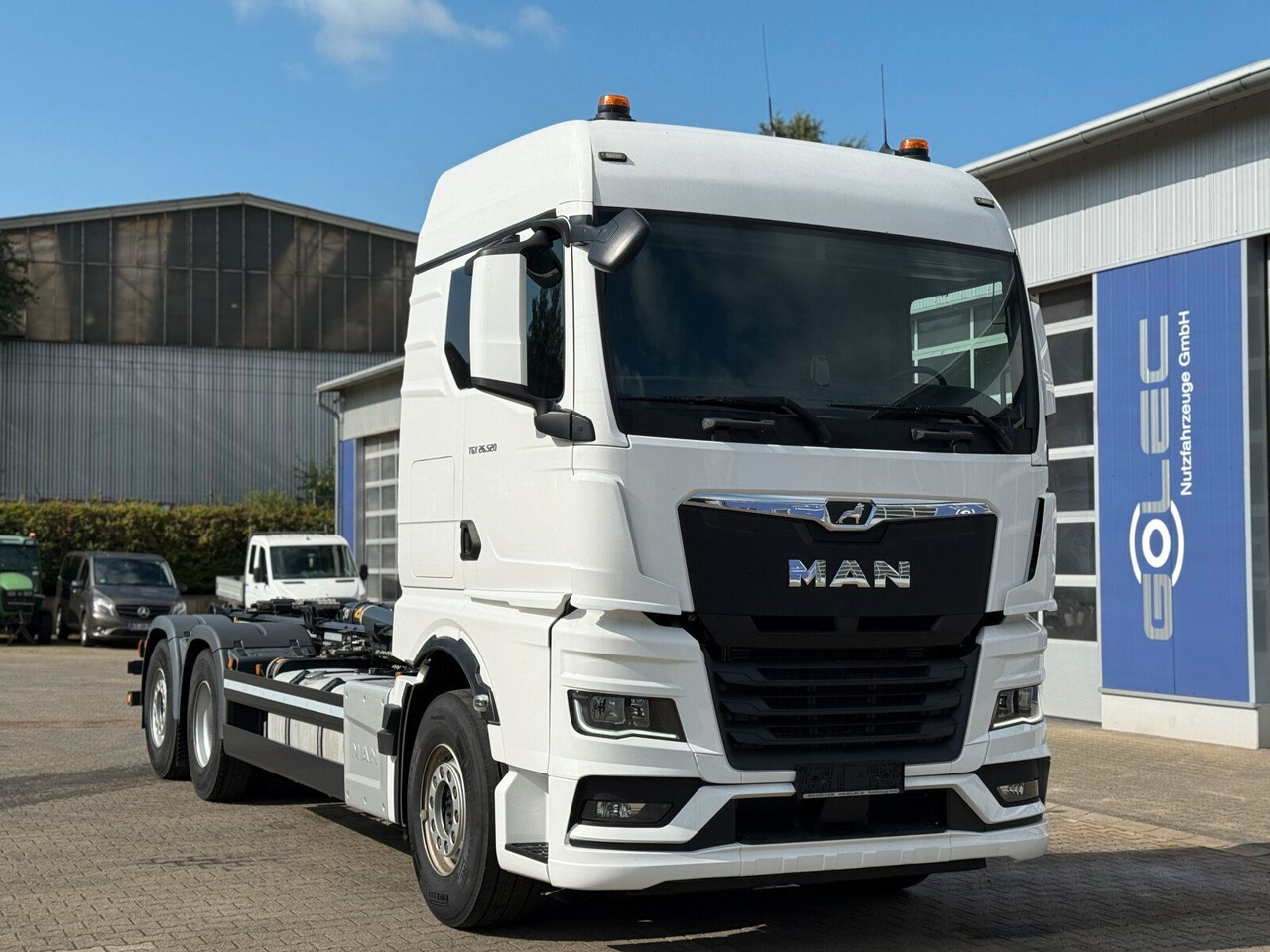 MAN TGX 26.520 6x2 Abrollkipper MEILLER RS 21.70 - Hook lift truck: picture 1 MAN TGX 26.520 6x2 Abrollkipper MEILLER RS 21.70 - Hook lift truck: picture 1