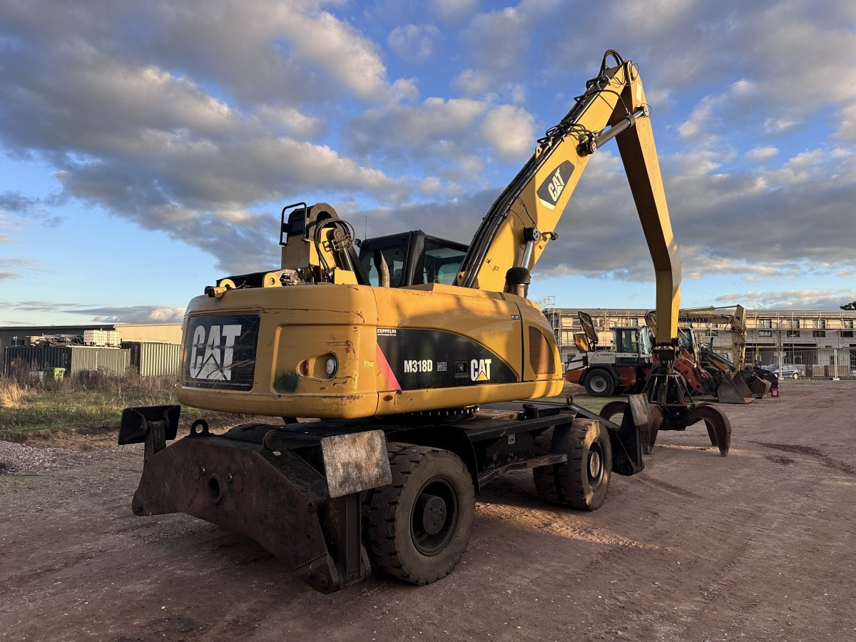 CATERPILLAR M 318 MH mit Greifer Kein 3022 3026 320 322 - Wheel excavator: picture 3 CATERPILLAR M 318 MH mit Greifer Kein 3022 3026 320 322 - Wheel excavator: picture 3