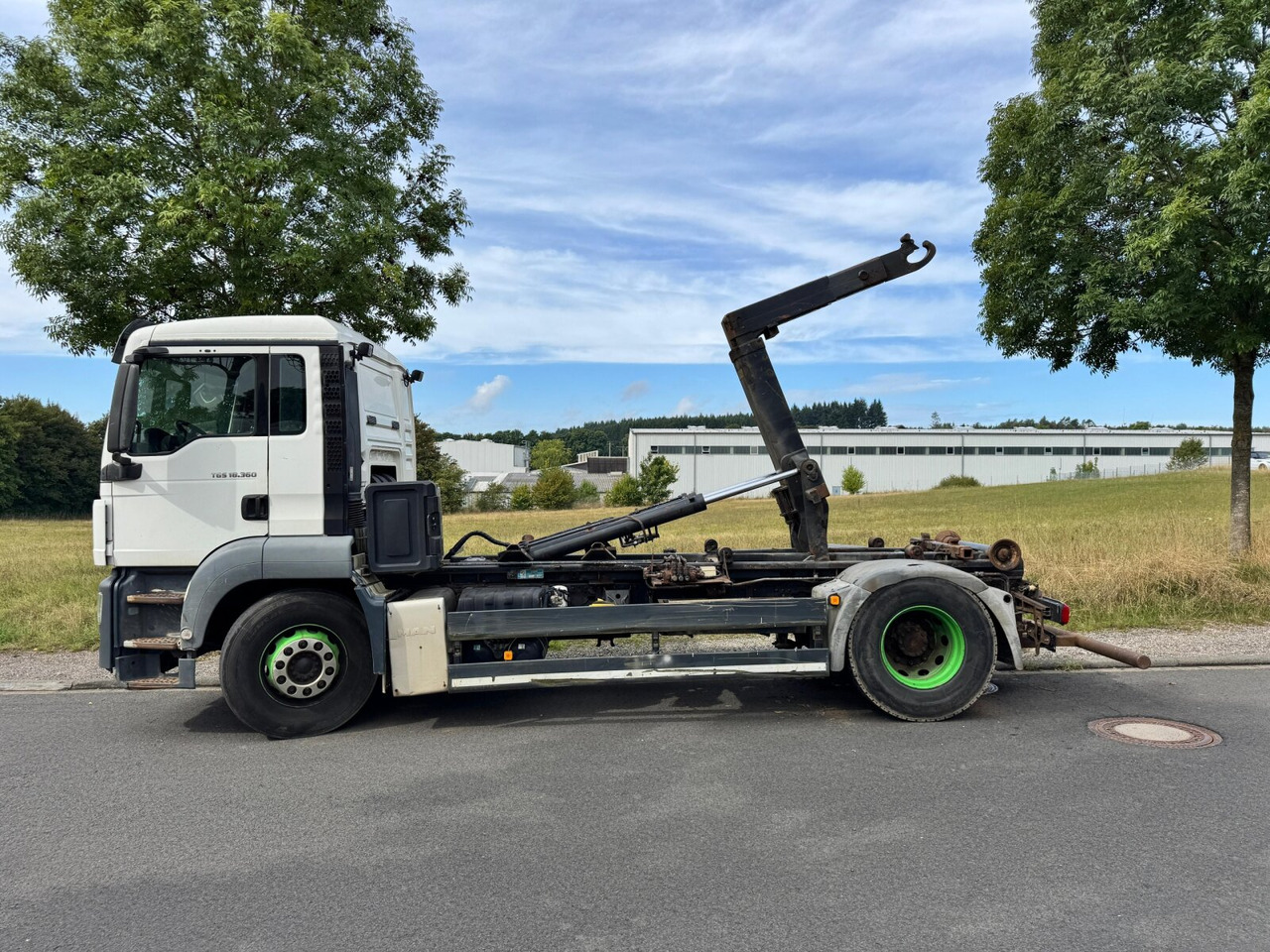 MAN TGS 18.360 4X2 BL TGS 18.360 4X2 BL, Hyva 10.45 S, Teleskopabrollanlage - Hook lift truck: picture 1 MAN TGS 18.360 4X2 BL TGS 18.360 4X2 BL, Hyva 10.45 S, Teleskopabrollanlage - Hook lift truck: picture 1