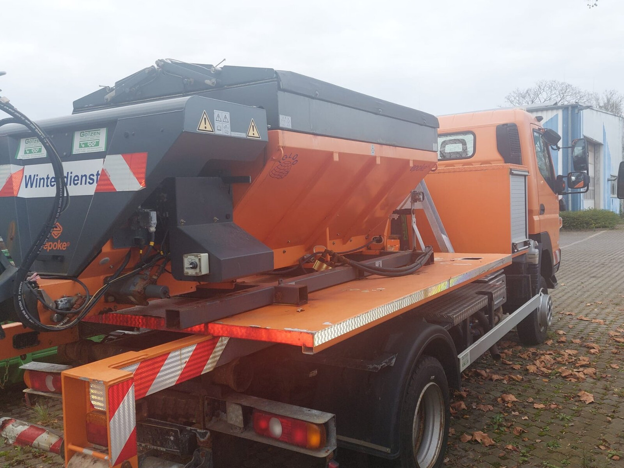 Mitsubishi Canter Fuso 6C18 4x4 Canter Fuso 6C18 4x4, Winterdienstausstattung, AJK HL 5-3.150 City-Abroller - Hook lift truck: picture 2 Mitsubishi Canter Fuso 6C18 4x4 Canter Fuso 6C18 4x4, Winterdienstausstattung, AJK HL 5-3.150 City-Abroller - Hook lift truck: picture 2