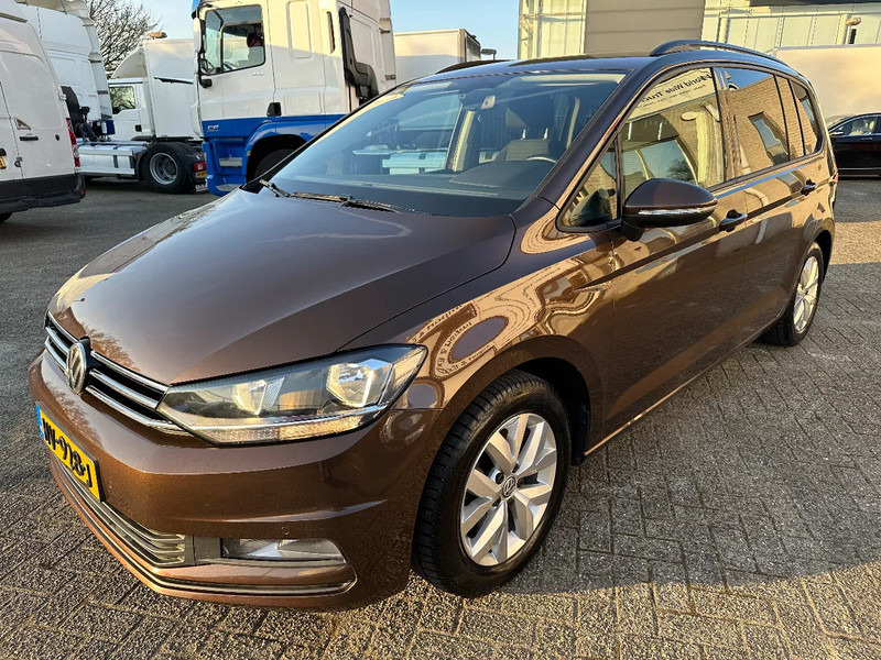Volkswagen Touran 1.2 TSI COMFORTLINE + APK / TUV + 4 WINTER TYRES WITH RIMS + NAVI + MARGE - Car: picture 1 Volkswagen Touran 1.2 TSI COMFORTLINE + APK / TUV + 4 WINTER TYRES WITH RIMS + NAVI + MARGE - Car: picture 1