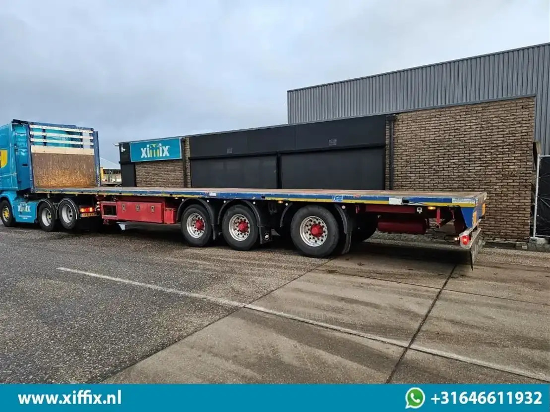 Meusburger 3-ass. Vlakke uitschuifbare oplegger / Naloop gestuurd / 14139 - Dropside/ Flatbed semi-trailer: picture 4 Meusburger 3-ass. Vlakke uitschuifbare oplegger / Naloop gestuurd / 14139 - Dropside/ Flatbed semi-trailer: picture 4