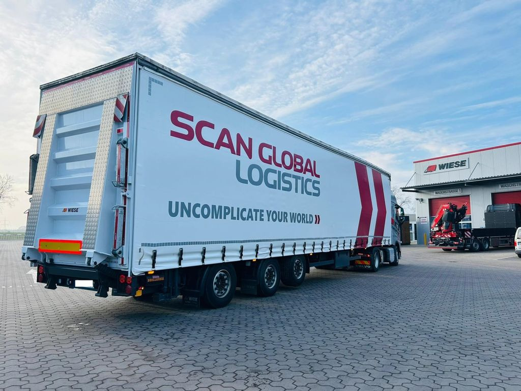 Mega Gabelstaplertransporter Ladebordwand9t Mega Gabelstaplertransporter Ladebordwand9t - Low loader semi-trailer: picture 2 Mega Gabelstaplertransporter Ladebordwand9t Mega Gabelstaplertransporter Ladebordwand9t - Low loader semi-trailer: picture 2