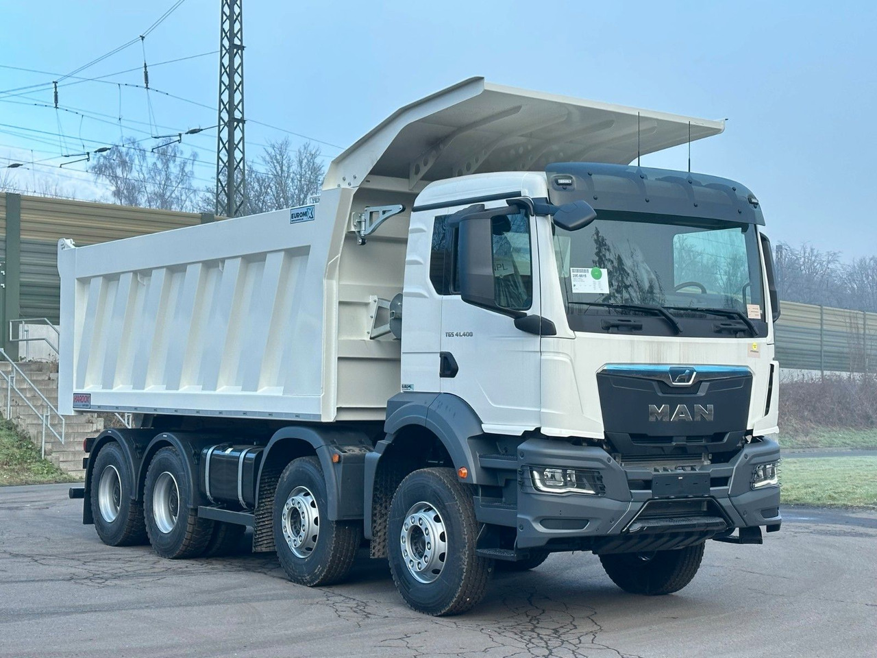 MAN TGS 41.400 8x4 / EUROMIX MTP 23m³/ Eckige Mulde MAN TGS 41.400 8x4 / EUROMIX MTP 23m³/ Eckige Mulde - Tipper: picture 4 MAN TGS 41.400 8x4 / EUROMIX MTP 23m³/ Eckige Mulde MAN TGS 41.400 8x4 / EUROMIX MTP 23m³/ Eckige Mulde - Tipper: picture 4
