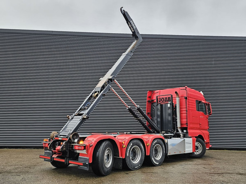 MAN TGX 35.500 / 8x4-4 / ABROLL-KIPPER / HOOKLIFT - Hook lift truck: picture 4 MAN TGX 35.500 / 8x4-4 / ABROLL-KIPPER / HOOKLIFT - Hook lift truck: picture 4