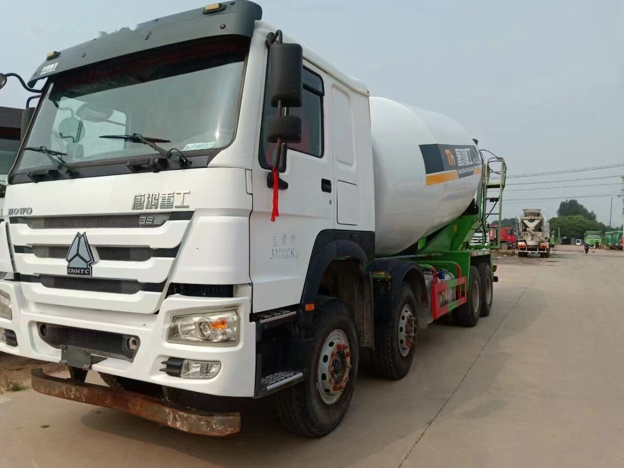 Sinotruk HOWO 8*4 Concrete mixer truck - Concrete mixer truck: picture 1 Sinotruk HOWO 8*4 Concrete mixer truck - Concrete mixer truck: picture 1