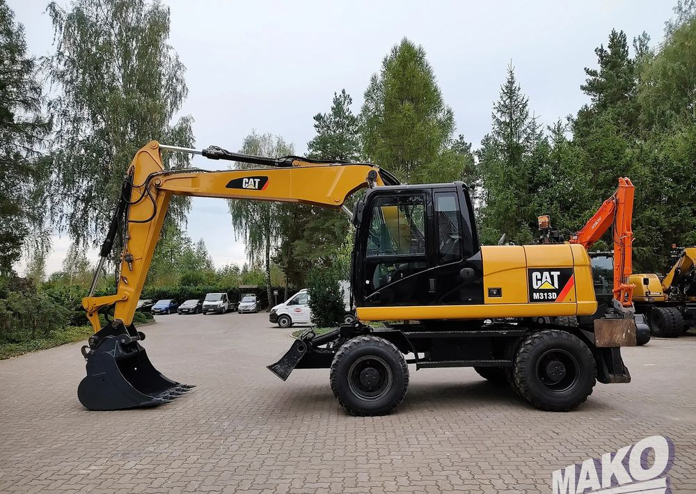 Caterpillar M313D - Wheel excavator: picture 1 Caterpillar M313D - Wheel excavator: picture 1