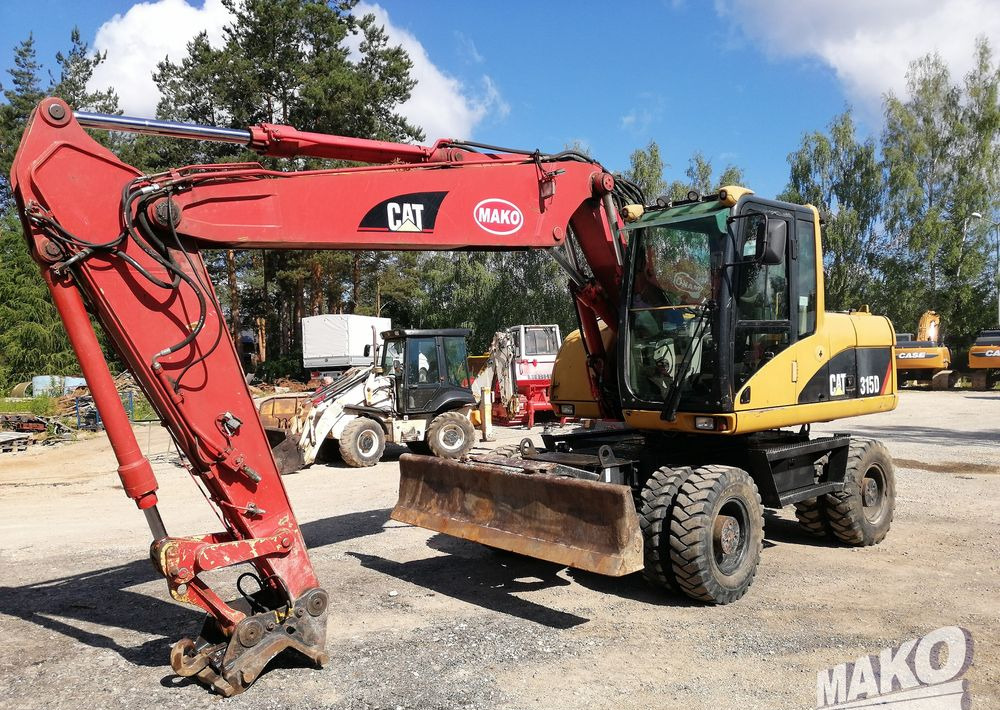 Caterpillar M315 C - Wheel excavator: picture 1 Caterpillar M315 C - Wheel excavator: picture 1