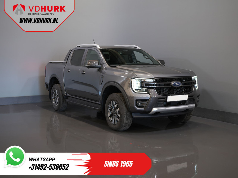 Ford Ranger Wildtrak 2.3 PHEV Double Cab 4x4/ B&O/ Tech-Pack/ Adapt.Cruise/ 3.5t Trekverm./ 360 Camera/ Leder/ Alarm/ Navi/ Carplay/ Trekhaa - Panel van, Combi van: picture 1 Ford Ranger Wildtrak 2.3 PHEV Double Cab 4x4/ B&O/ Tech-Pack/ Adapt.Cruise/ 3.5t Trekverm./ 360 Camera/ Leder/ Alarm/ Navi/ Carplay/ Trekhaa - Panel van, Combi van: picture 1