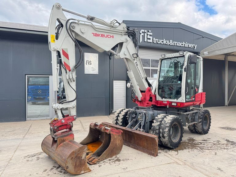 Takeuchi TB295W - 2014 Year - Powertilt - 3X Buckets - Wheel excavator: picture 1 Takeuchi TB295W - 2014 Year - Powertilt - 3X Buckets - Wheel excavator: picture 1