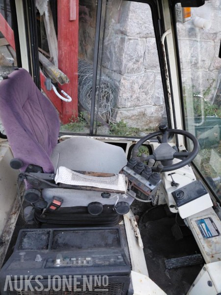 1993 Nissan RGH02A30U gaffeltruck - Material handling equipment: picture 5 1993 Nissan RGH02A30U gaffeltruck - Material handling equipment: picture 5