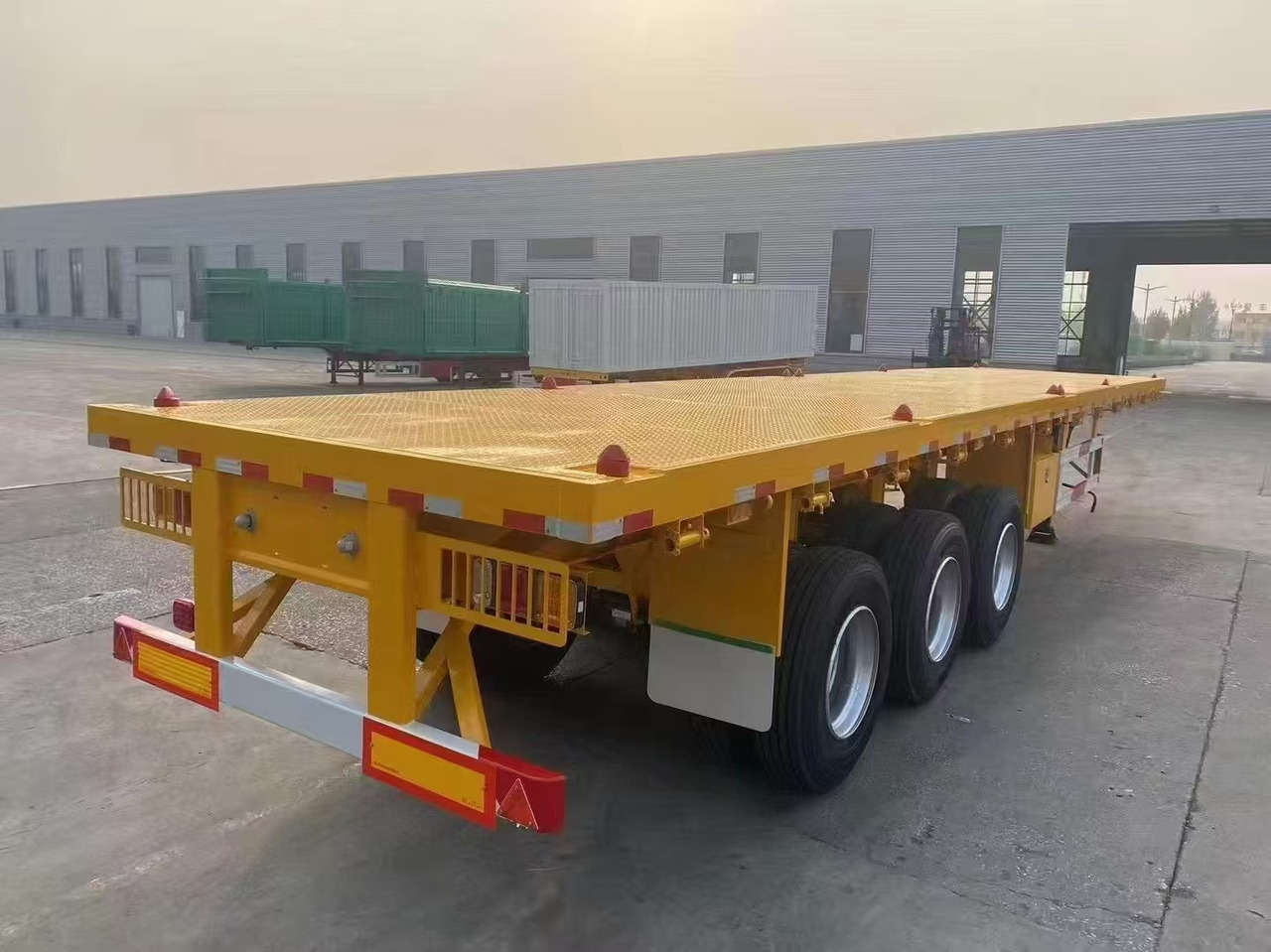 Low loader semi-trailer ZHICHENG Semni Flat Bed Low Bed Floater with 3 Axles 4 Axles New or Used 12M 13.75M In High Quality: picture 26 Low loader semi-trailer ZHICHENG Semni Flat Bed Low Bed Floater with 3 Axles 4 Axles New or Used 12M 13.75M In High Quality: picture 26
