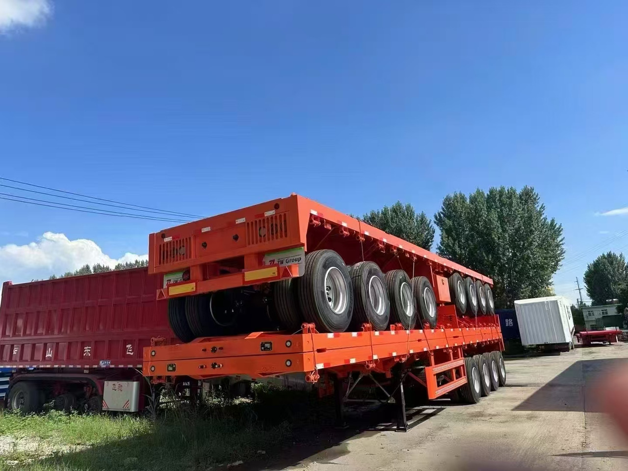 Low loader semi-trailer ZHICHENG Semni Flat Bed Low Bed Floater with 3 Axles 4 Axles New or Used 12M 13.75M In High Quality: picture 9 Low loader semi-trailer ZHICHENG Semni Flat Bed Low Bed Floater with 3 Axles 4 Axles New or Used 12M 13.75M In High Quality: picture 9
