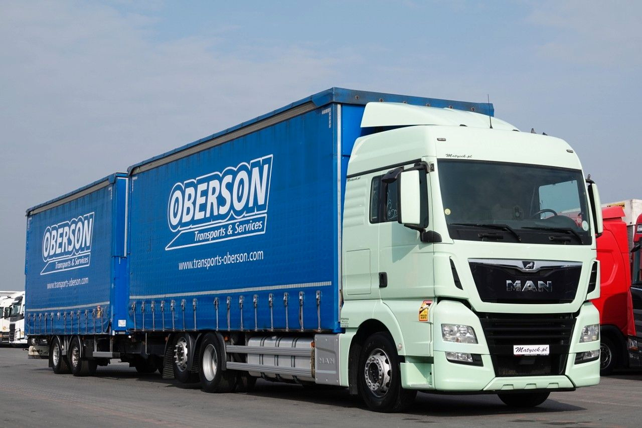 MAN TGX 26.460 / ZESTAW TANDEM PRZEJAZDOWY / 120 M3 - Curtainsider truck: picture 1 MAN TGX 26.460 / ZESTAW TANDEM PRZEJAZDOWY / 120 M3 - Curtainsider truck: picture 1