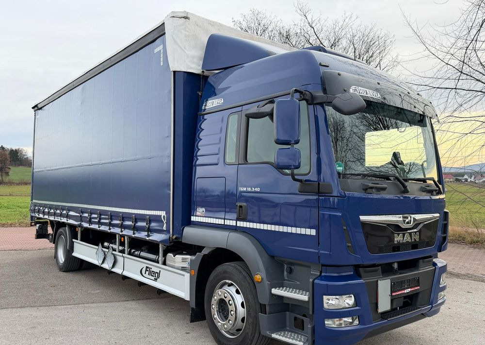 MAN TGM 18.340 / FIRANKA / LIFT / SPROWADZONY / KLIMA POSTOJOWA / 2017 / 9700 ŁADOWNOŚĆ / AUTOMAT / 18 PALET / E6 / WINDA / - Curtainsider truck: picture 1 MAN TGM 18.340 / FIRANKA / LIFT / SPROWADZONY / KLIMA POSTOJOWA / 2017 / 9700 ŁADOWNOŚĆ / AUTOMAT / 18 PALET / E6 / WINDA / - Curtainsider truck: picture 1