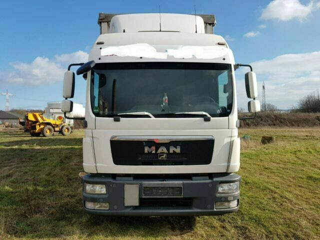 MAN TGL8.240 G.Haus/2xBett Klima AHK - Curtainsider truck: picture 1 MAN TGL8.240 G.Haus/2xBett Klima AHK - Curtainsider truck: picture 1