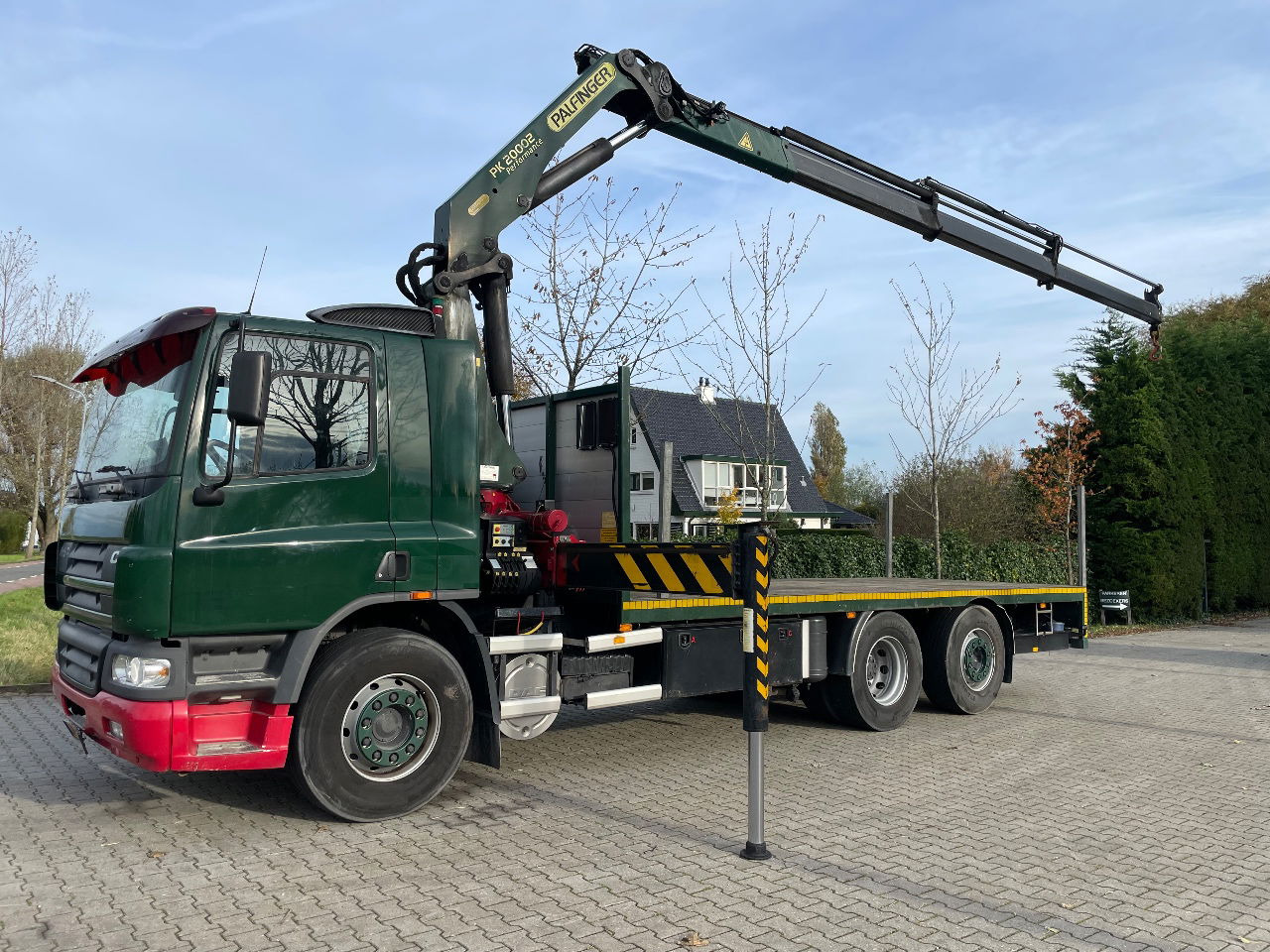 DAF CF 75.310 With Palfinger PK20002 crane - Dropside/ Flatbed truck, Crane truck: picture 1 DAF CF 75.310 With Palfinger PK20002 crane - Dropside/ Flatbed truck, Crane truck: picture 1