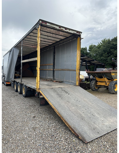 Schmitz Cargobull Machine transport trailer with bag ramp - Semi-trailer: picture 1 Schmitz Cargobull Machine transport trailer with bag ramp - Semi-trailer: picture 1