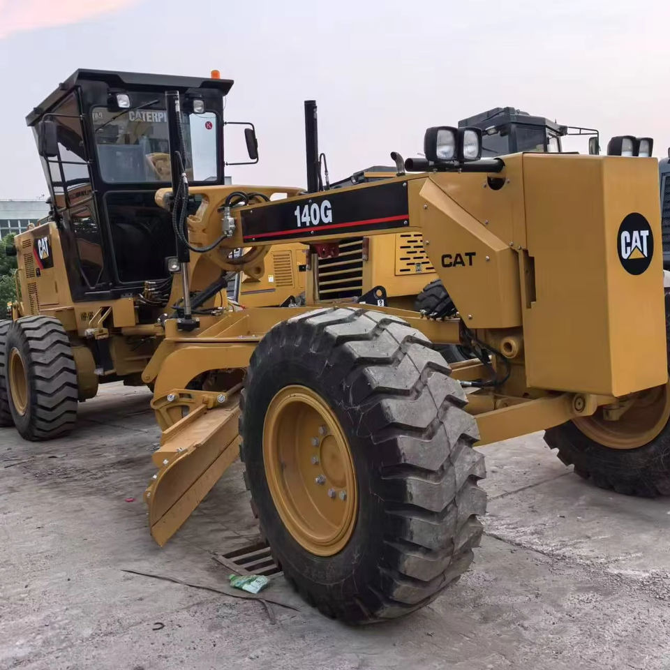Second Hand Used Construction Machinery Japanese CAT 140G Grader Caterpillar Brand for Sale With Good Condition and Price - Grader: picture 1 Second Hand Used Construction Machinery Japanese CAT 140G Grader Caterpillar Brand for Sale With Good Condition and Price - Grader: picture 1