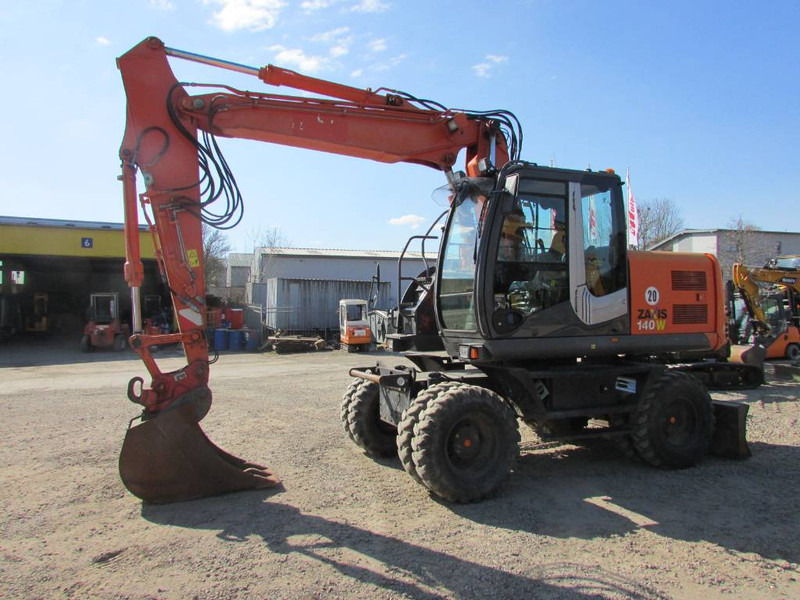 Hitachi ZX 140 W-3 Mobilbagger 48.000 EUR / Klima - Wheel excavator: picture 1 Hitachi ZX 140 W-3 Mobilbagger 48.000 EUR / Klima - Wheel excavator: picture 1