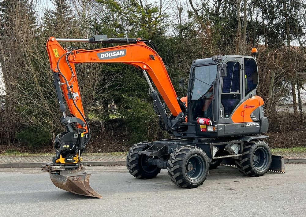 Doosan DOOSAN DX57W *ROTOTILT* 2200 Motogodzin * Jak Nowa * Sprowadzona * Stan Perfekcyjny - Wheel excavator: picture 1 Doosan DOOSAN DX57W *ROTOTILT* 2200 Motogodzin * Jak Nowa * Sprowadzona * Stan Perfekcyjny - Wheel excavator: picture 1