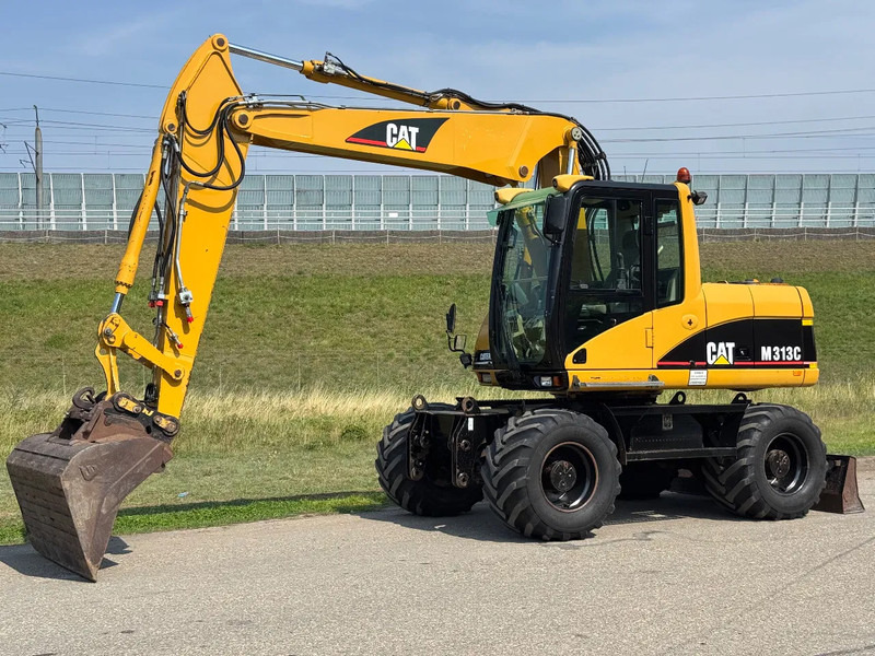 Caterpillar M313C - Wheel excavator: picture 1 Caterpillar M313C - Wheel excavator: picture 1