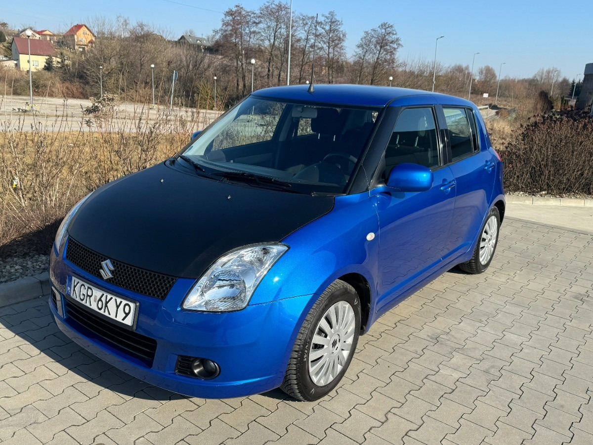 Suzuki Swift 1.3 benzyna 90km Klimatyzacja 136tys przebieg Auto prywatne zadbane - Car: picture 3 Suzuki Swift 1.3 benzyna 90km Klimatyzacja 136tys przebieg Auto prywatne zadbane - Car: picture 3