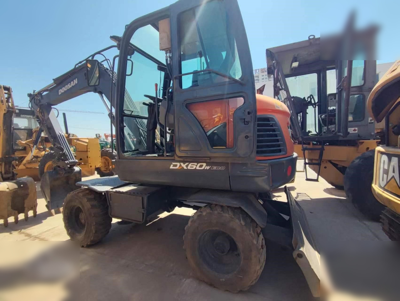 DOOSAN DX60W ECO - Wheel excavator: picture 1 DOOSAN DX60W ECO - Wheel excavator: picture 1