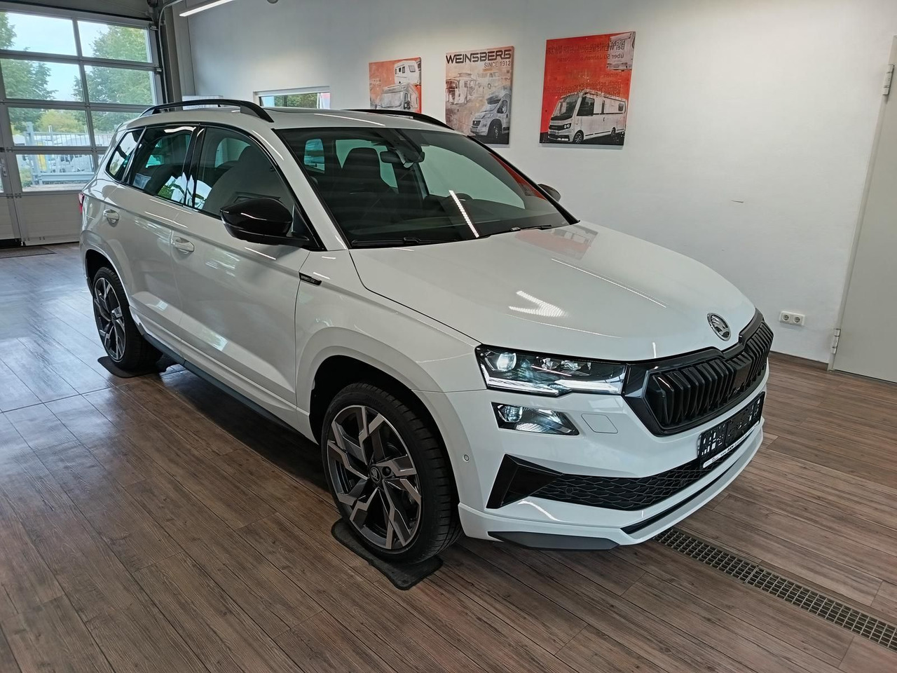 Skoda Karoq Sportline 1,5 TSI DSG*AHK*PSD*STD.HZG*NAVI - SUV: picture 3 Skoda Karoq Sportline 1,5 TSI DSG*AHK*PSD*STD.HZG*NAVI - SUV: picture 3