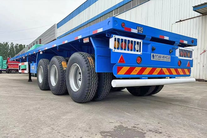 TITAN 3 Axle Flatbed Semi Trailer Manufacturers for Sale in Ghana - Dropside/ Flatbed semi-trailer: picture 5 TITAN 3 Axle Flatbed Semi Trailer Manufacturers for Sale in Ghana - Dropside/ Flatbed semi-trailer: picture 5