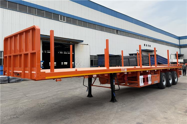 TITAN Container Flatbed Truck Trailer with Piles In Angola - Container transporter/ Swap body semi-trailer: picture 2 TITAN Container Flatbed Truck Trailer with Piles In Angola - Container transporter/ Swap body semi-trailer: picture 2