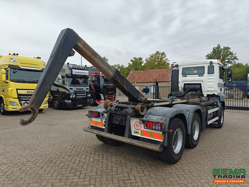 MAN TGS-TGX 26.440 6x4 Dagcabine Euro5 - AJK 20T HaakarmSysteem - Volledig Bladgeveerd - Naafreductie - Handgeschakeld - Hook lift truck: picture 2 MAN TGS-TGX 26.440 6x4 Dagcabine Euro5 - AJK 20T HaakarmSysteem - Volledig Bladgeveerd - Naafreductie - Handgeschakeld - Hook lift truck: picture 2