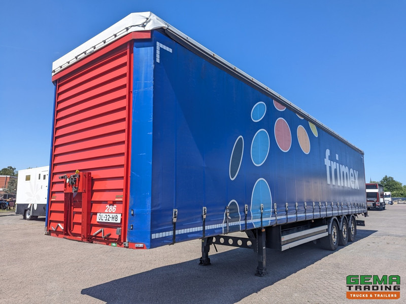 Merker M300-01-OY 3-Assen SAF - Lift as - Schuifzeilen/dak - Rongen/Rongpotten - Kooiaap aansluiting - 6600KG - Curtainsider semi-trailer: picture 1 Merker M300-01-OY 3-Assen SAF - Lift as - Schuifzeilen/dak - Rongen/Rongpotten - Kooiaap aansluiting - 6600KG - Curtainsider semi-trailer: picture 1
