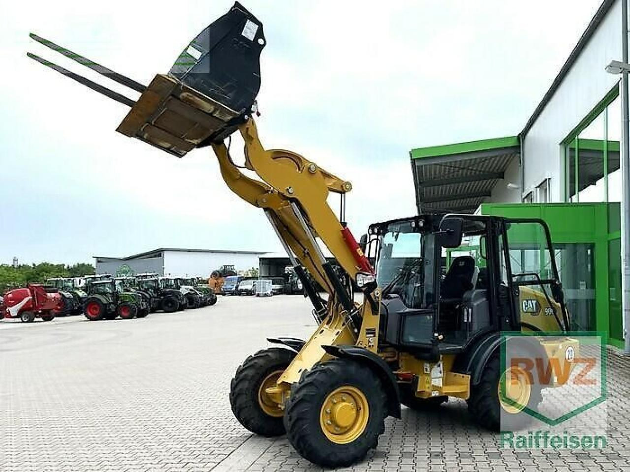 Caterpillar 906 radlader - Mini excavator: picture 1 Caterpillar 906 radlader - Mini excavator: picture 1