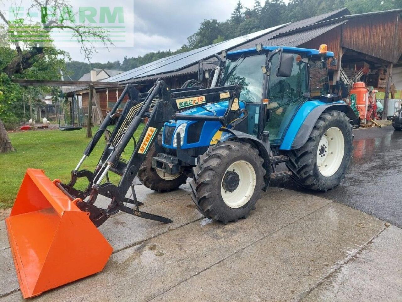 New Holland tl 90 a A - Farm tractor: picture 1 New Holland tl 90 a A - Farm tractor: picture 1