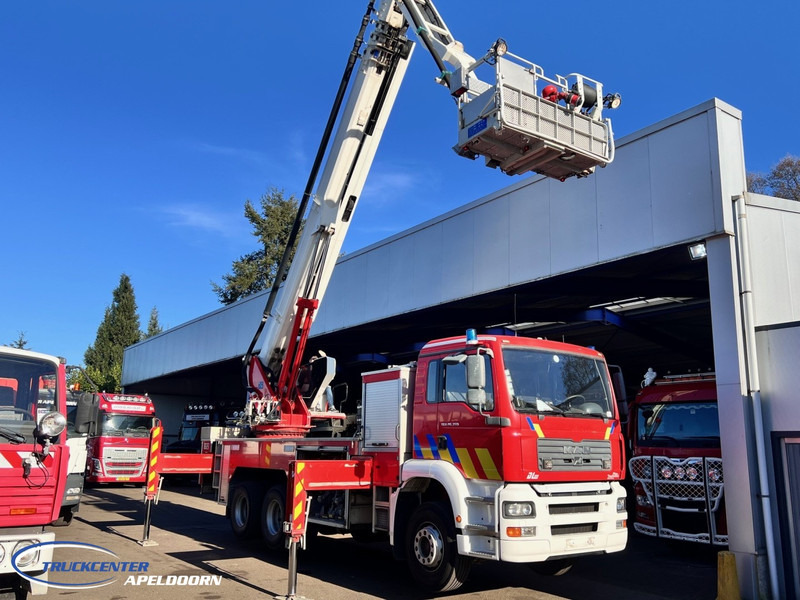 MAN TGA 26.350 Magirus ALP 320L = 32 meter, Waterpump, 6x4, Steel springs - Truck: picture 2 MAN TGA 26.350 Magirus ALP 320L = 32 meter, Waterpump, 6x4, Steel springs - Truck: picture 2