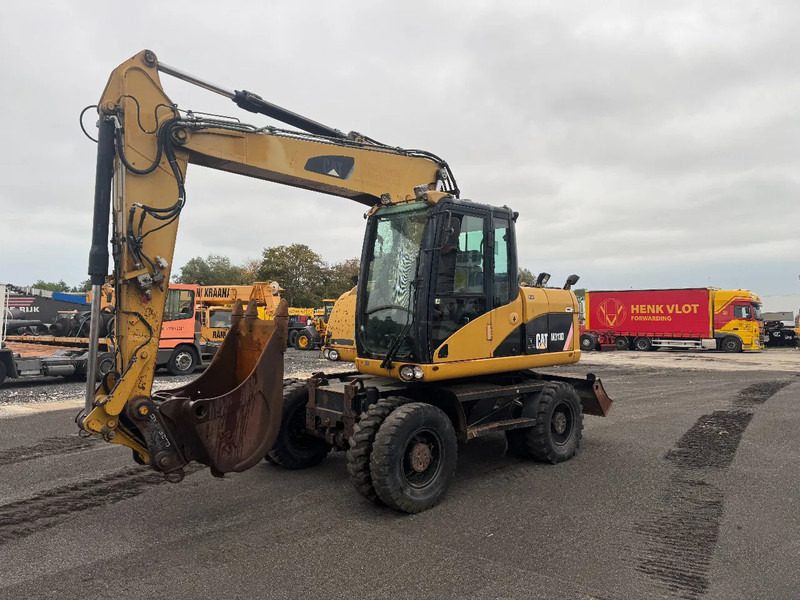 Caterpillar M313D 7212 HOURS - Wheel excavator: picture 1 Caterpillar M313D 7212 HOURS - Wheel excavator: picture 1