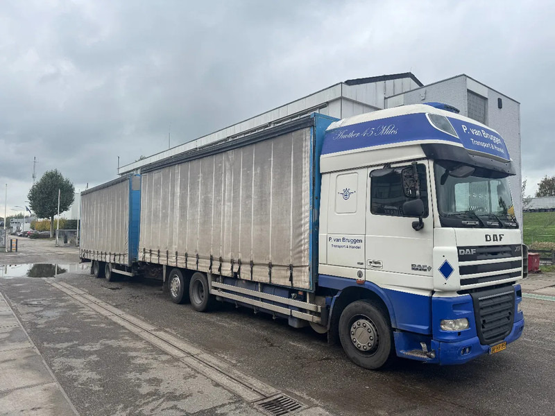 DAF XF 105.410 6X2 EURO 5 + GROENEWEGEN HANGER - Curtainsider truck: picture 2 DAF XF 105.410 6X2 EURO 5 + GROENEWEGEN HANGER - Curtainsider truck: picture 2