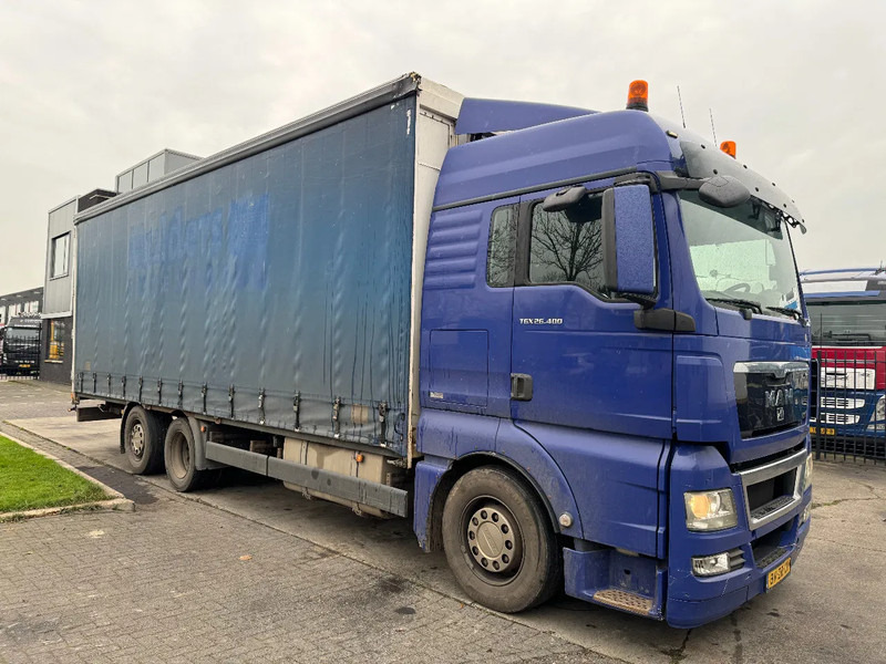MAN TGX 26.400 6X2 - EURO 4 + LIFT + STEERING AXLE - Curtainsider truck: picture 3 MAN TGX 26.400 6X2 - EURO 4 + LIFT + STEERING AXLE - Curtainsider truck: picture 3