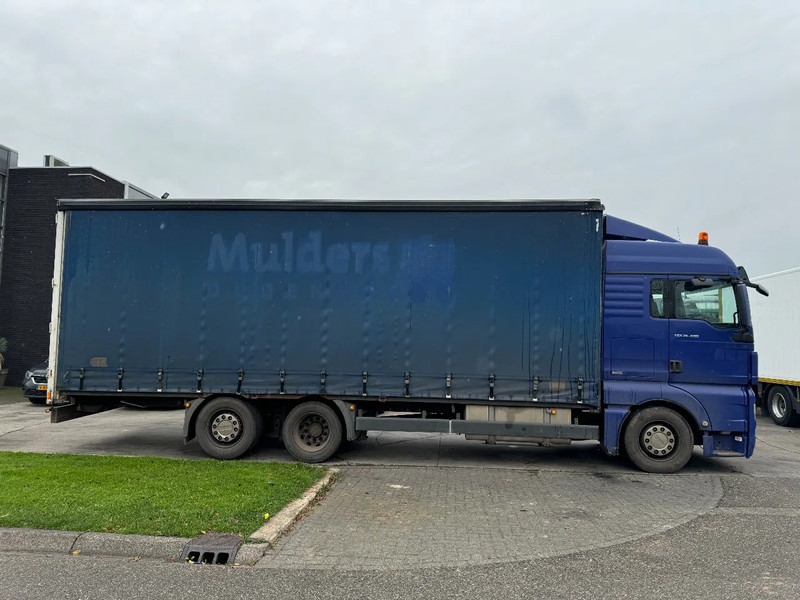 MAN TGX 26.400 6X2 - EURO 4 + LIFT + STEERING AXLE - Curtainsider truck: picture 4 MAN TGX 26.400 6X2 - EURO 4 + LIFT + STEERING AXLE - Curtainsider truck: picture 4
