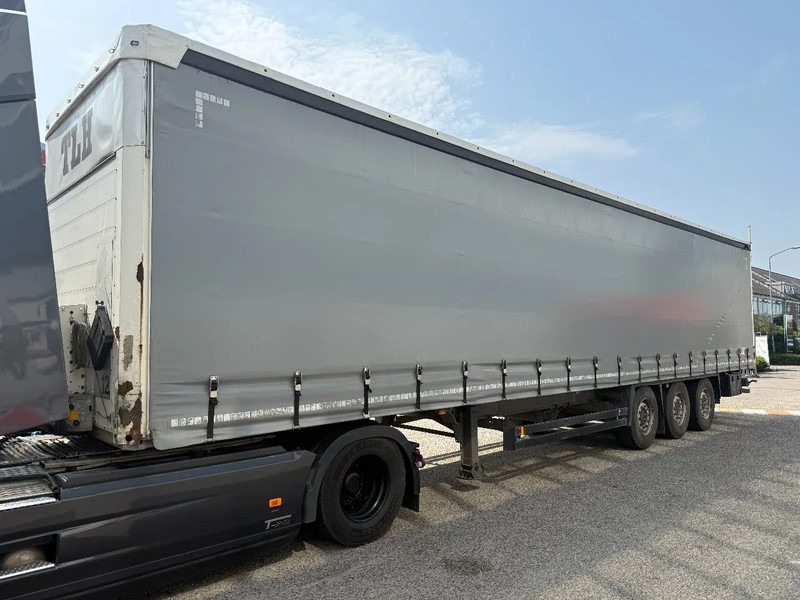 Schmitz Cargobull 3 AXLE + COIL - DISC BRAKES + SLIDING ROOF - Curtainsider semi-trailer: picture 1 Schmitz Cargobull 3 AXLE + COIL - DISC BRAKES + SLIDING ROOF - Curtainsider semi-trailer: picture 1