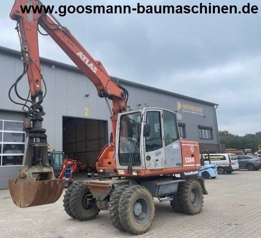 Atlas 1304 mit Greifer - Wheel excavator: picture 1 Atlas 1304 mit Greifer - Wheel excavator: picture 1