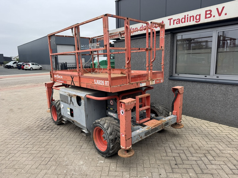 Skyjack SJ 6826RT Schaarhoogwerker / Scissor / Arbeitsbuhne 2015 4X4 Kubota Diesel 10M Werkhoogte - Scissor lift: picture 3 Skyjack SJ 6826RT Schaarhoogwerker / Scissor / Arbeitsbuhne 2015 4X4 Kubota Diesel 10M Werkhoogte - Scissor lift: picture 3