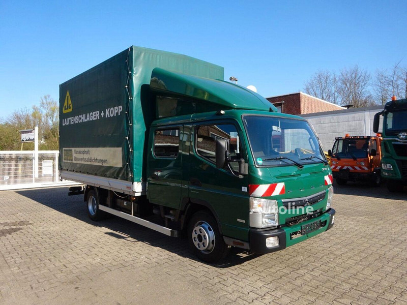 Mitsubishi FUSO Canter 7C180D Doka Koffer - Box truck: picture 2 Mitsubishi FUSO Canter 7C180D Doka Koffer - Box truck: picture 2