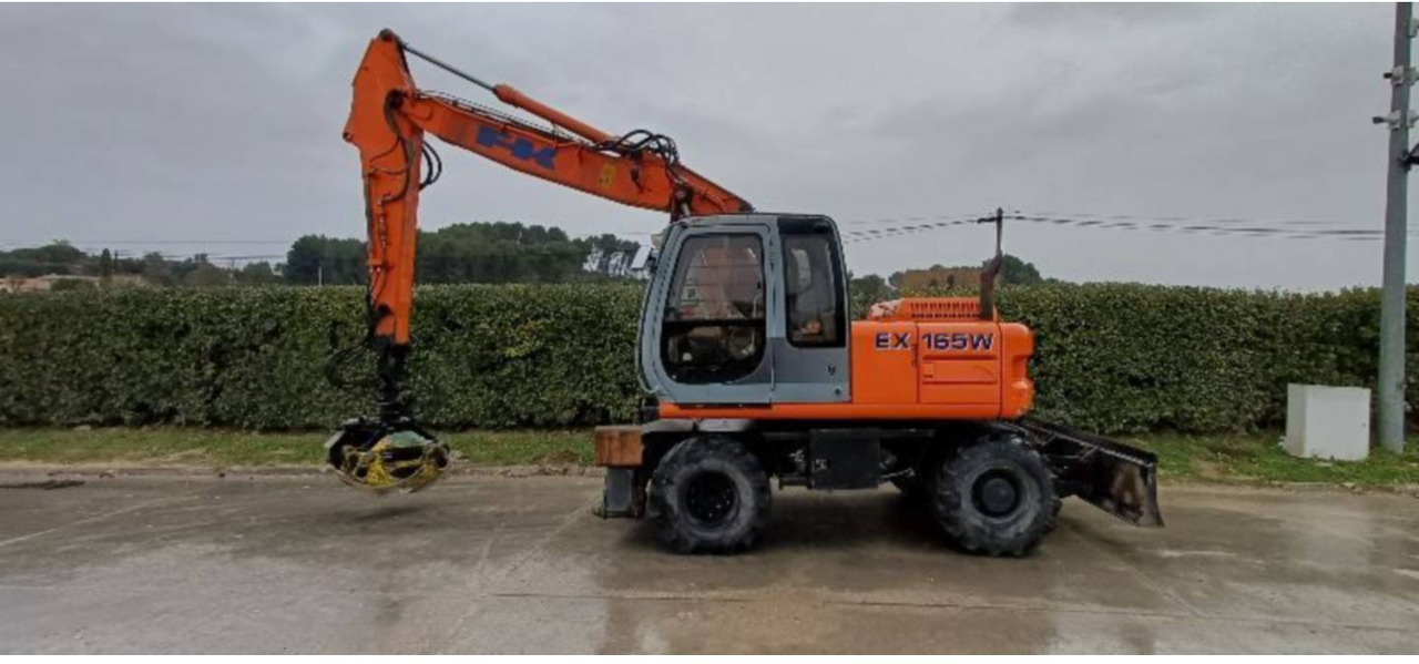 FIAT ALLIS / NEW HOLLAND EX165W - Wheel excavator: picture 1 FIAT ALLIS / NEW HOLLAND EX165W - Wheel excavator: picture 1