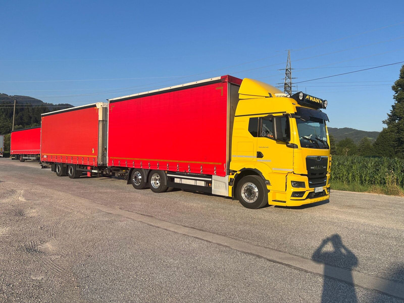 MAN TGS 26.510 6X2-4LL + SCHMITZ 120m3 - Curtainsider truck: picture 1 MAN TGS 26.510 6X2-4LL + SCHMITZ 120m3 - Curtainsider truck: picture 1